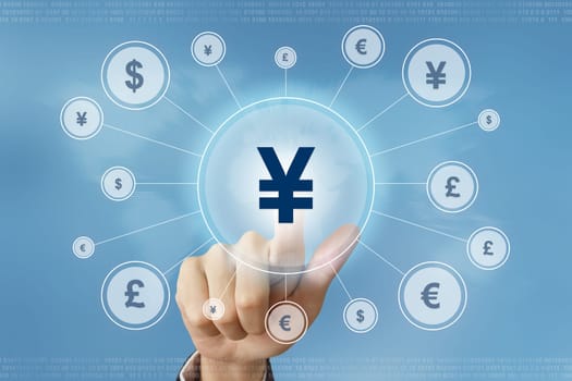 business hand pushing japanese yen currency button with global networking concept