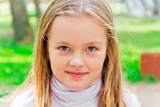 Photo of cute girl with big blue eyes