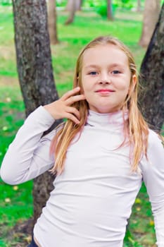 Photo of cute playing girl in summer
