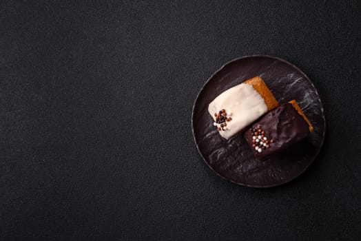 Round sweet New York roll croissant with chocolate cream filling on a dark concrete background