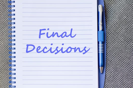 Final decisions text concept write on notebook with pen