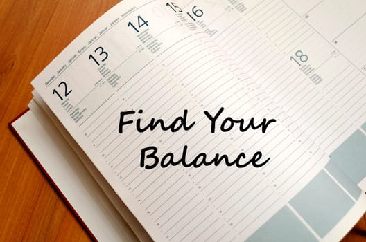 Find your balance text concept write on notebook
