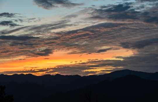 Beautiful sunset skyline over mountain landscape in Maehongson Province, Thailand