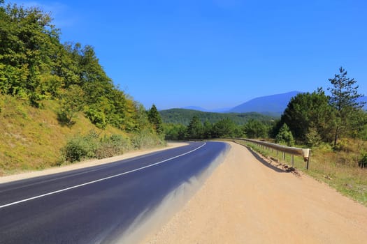 Image of landscape with line of road