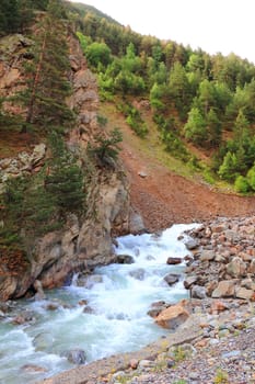 Image of waterfall in Caucasus mountains in summer