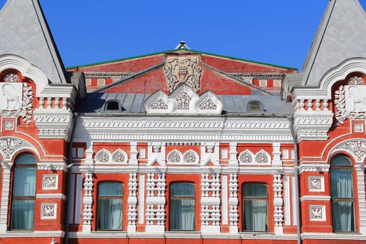 Town landscape with historic theater and blue sky