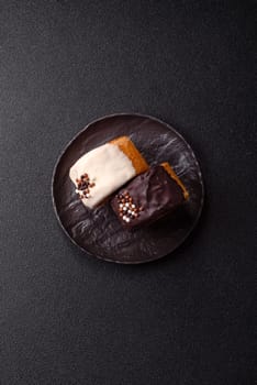Round sweet New York roll croissant with chocolate cream filling on a dark concrete background