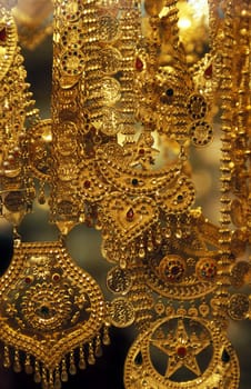a Gold shop the souq or Market in the old town in the city of Dubai in the Arab Emirates in the Gulf of Arabia.