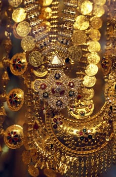 a Gold shop the souq or Market in the old town in the city of Dubai in the Arab Emirates in the Gulf of Arabia.