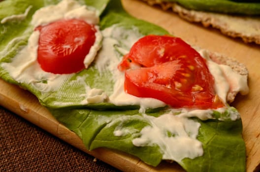 Whole grain bread with salad and cheese