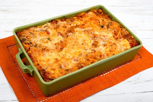 lasagna dish on orange towel
