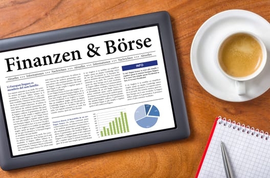Tablet on desk - Finance and stock exchange