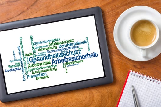 Tablet on desk - Health and safety in the workplace