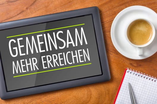 Tablet on desk - Achieve more together