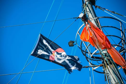 pirate flag on sailing ship.