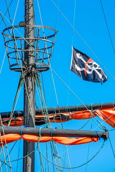 Pirate flag on the sailing ship.