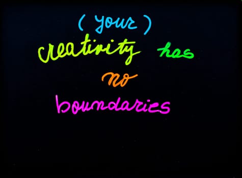 Your creativity has no boundaries message, handwriting with chalk on blackboard, free thinking concept