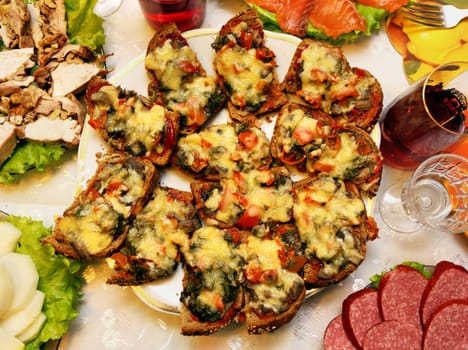 Delicious sandwiches with mushrooms and cheese on a large plate