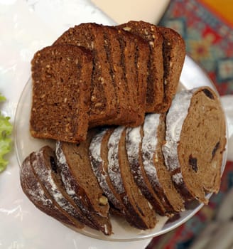 delicious bread on a plate on the festive table home