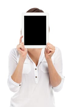 Cute woman presenting a digital tablet in front of her face, isolated on white