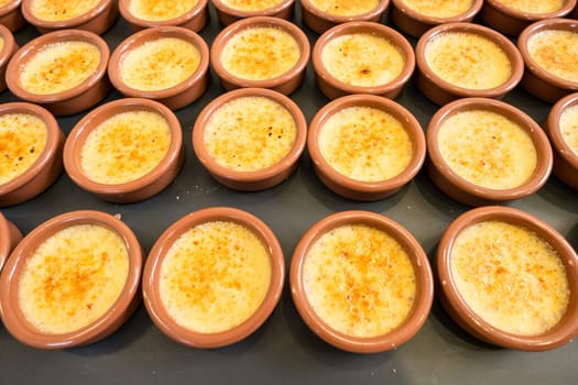 Buffet with bowls with creme Brulee