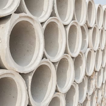 Concrete drainage pipes for industrial building construction.