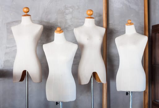 Mannequin tailors in storage room, stock photo