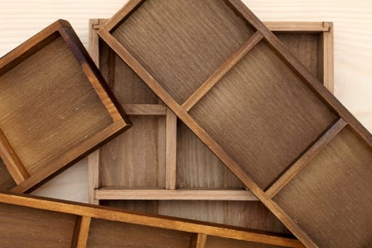 Stack of empty wooden box on wood background