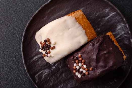 Round sweet New York roll croissant with chocolate cream filling on a dark concrete background