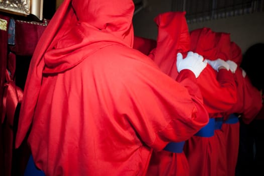Costaleros carriying a float during the Holy Week Procession, Spain