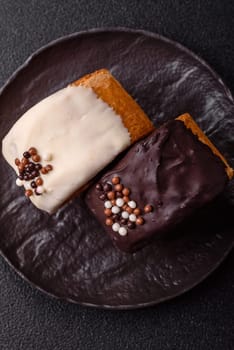 Round sweet New York roll croissant with chocolate cream filling on a dark concrete background
