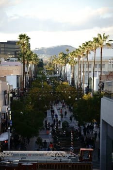 Santa Monica,United States - December 28,2015: The palm-fringed shopping street,third street,with visitors and pedestrians and a firefighting operation on December 28,2015 in Santa Monica.
