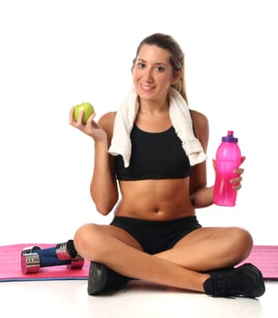 Happy young woman with her fitness equipment over white