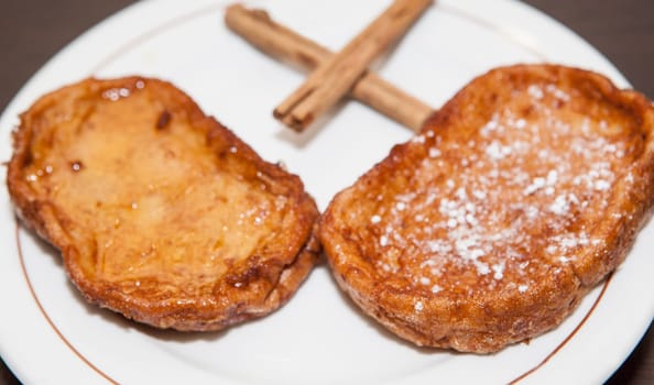 Traditional Holy week torrijas on plate, Spain