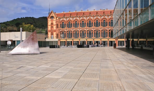 Outside of an large modernism red brick building. Barcelona, Spain