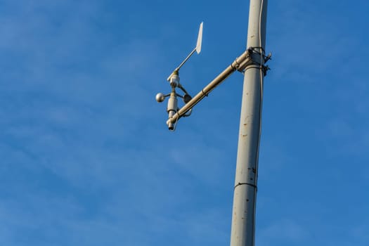 Weather station with anemometer on blue sky... Weather station with anemometer on blue sky.