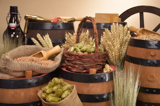 Beer barrels,beer bottle,hammer and tap with wheat,barley,hops and malt