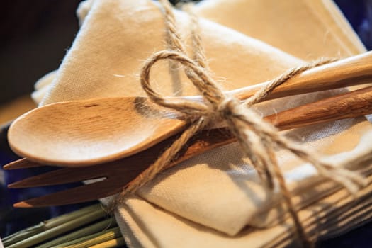 The Wooden spoon and fork on table