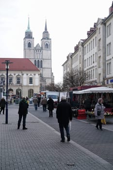 Pedestrians on their way to the old market in Magdeburg