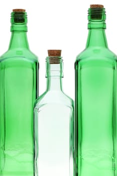 Empty glass bottle with cork stopper isolated on white background