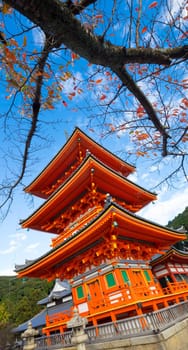 Kiyomizu dera, orange pagoda in japnese temple in Kyoto, Japan, in fall.