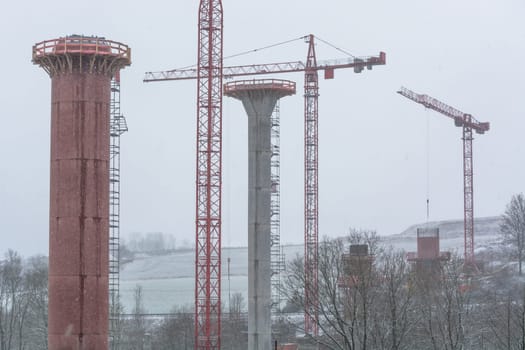 Bridge construction site,bridge under construction seen from below during snow drifts. .