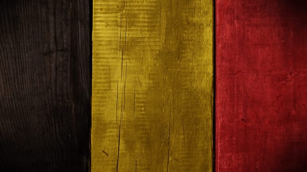 Wooden texture background with the colors of the Belgian flag