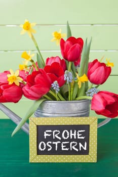 Fresh colorful frugal flowers in vintage tin casting can