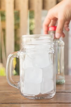 Drinking water and iced glass, stock photo