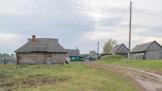 Dilapidated old wooden houses in the countryside.