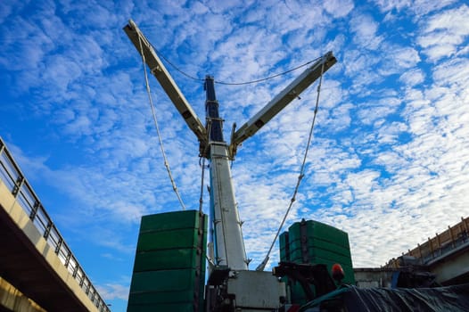 Crane for heavy load dismantles motorway
