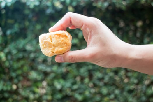 Homemade butter scone on hand, stock photo