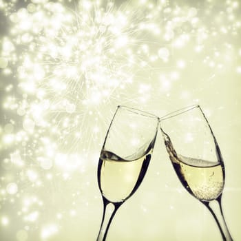 Champangne glasses on sparkling background