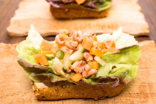 Bread rolls with crab,salad,papaya and celery